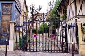 Iron gates to private street in Paris.